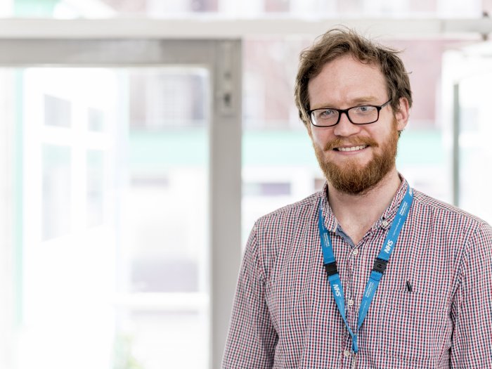 man with beard, looking at camera, primary care