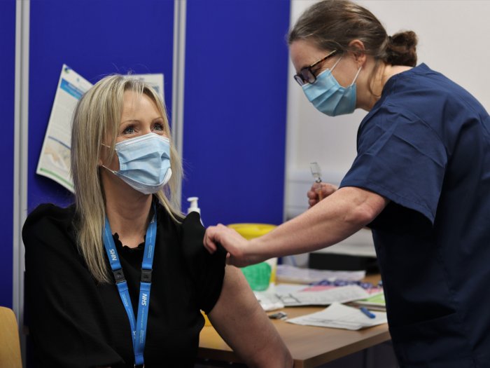 Donna Prescott receiving COVID-19 vaccine