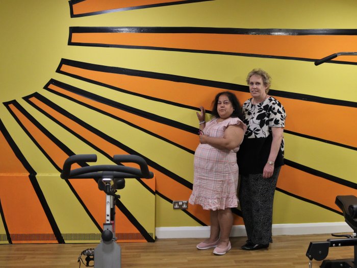 Rashida Ahmed and Maxine Coulson, who helped to paint the wall