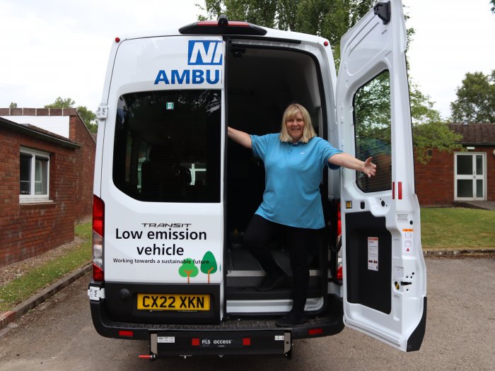 Woodland View staff member with minibus