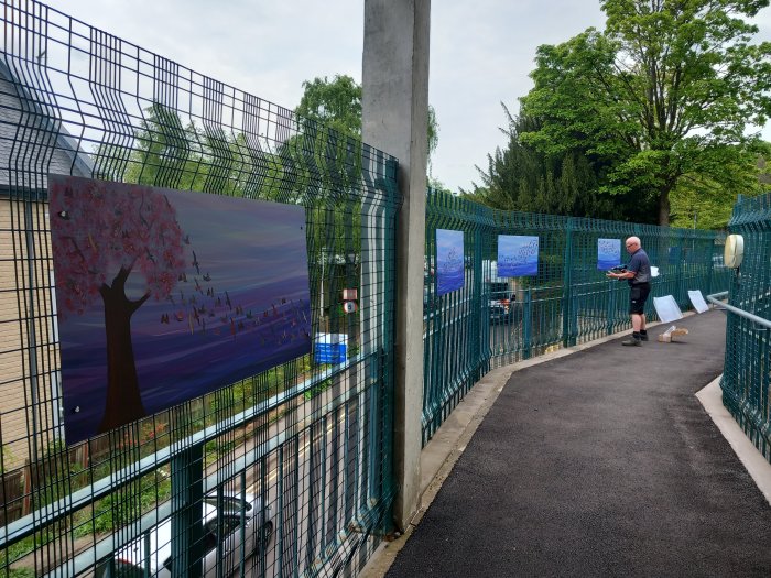 Art being put up on the bridge 