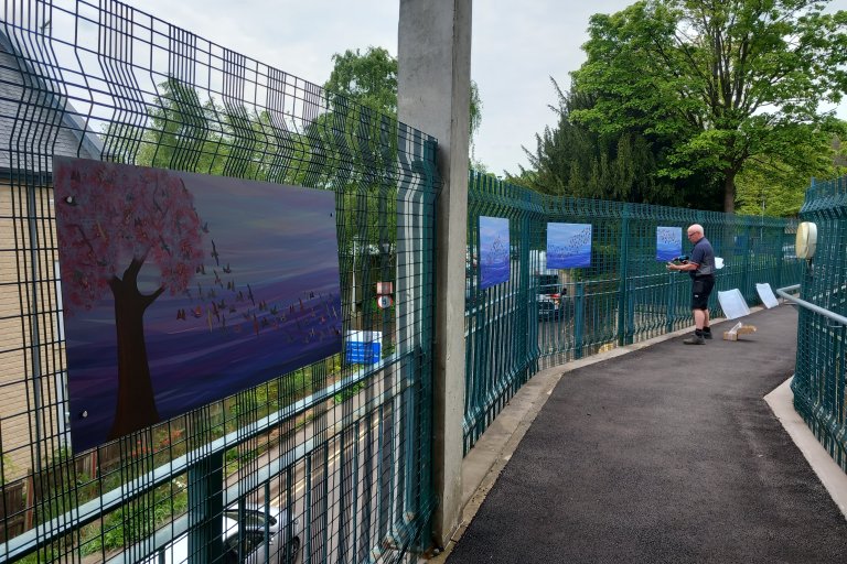 Art being put up on the bridge 