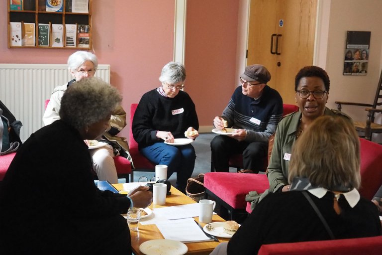 Group of people eating cake 