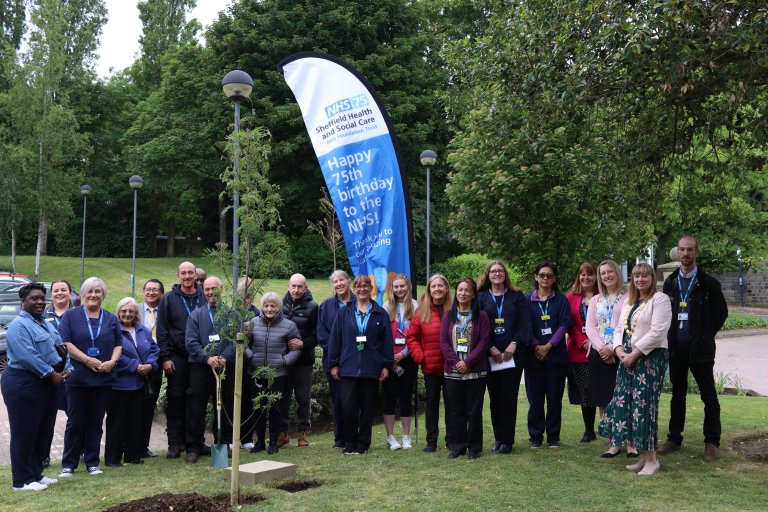 A group photo of all of those in attendance at todays tree planting and time capsule ceremony