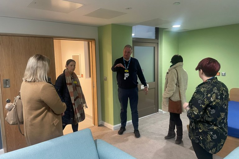 Ian Wright, therapeutic environments clinical lead, leads a tour of the site for visitors from Rotherham, Doncaster and South Humber NHS Foundation Trust