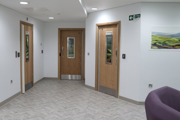 Corridor with three doors