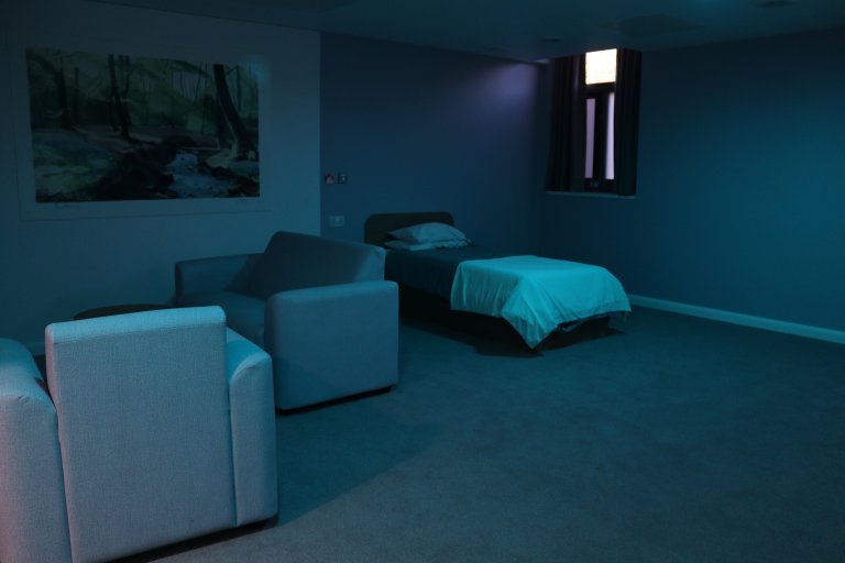 Large bedroom in low blue light