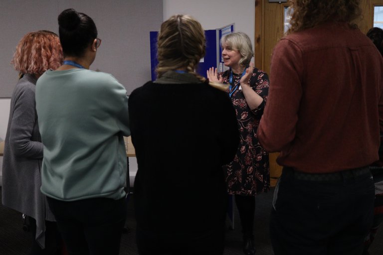 People discussing at engagement event