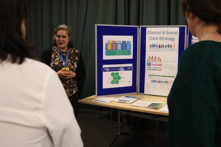 People discussing at engagement event