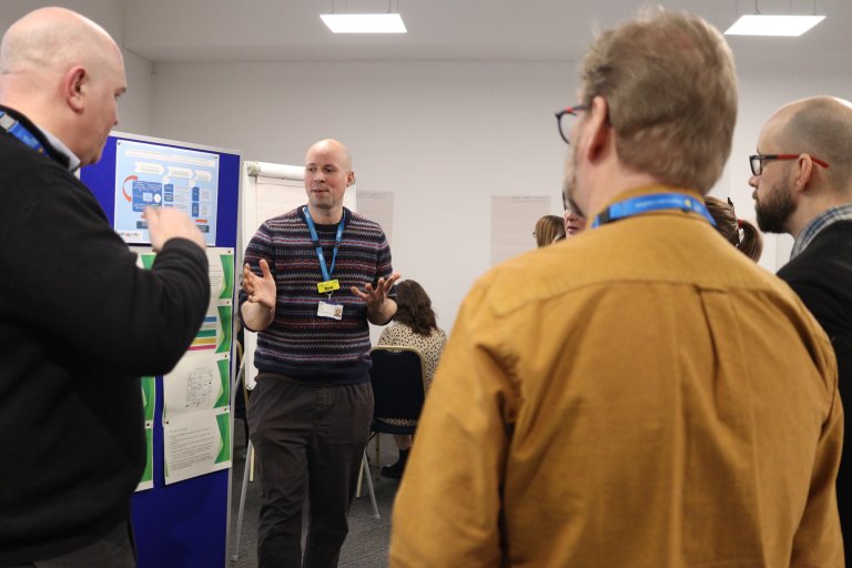 People discussing at engagement event