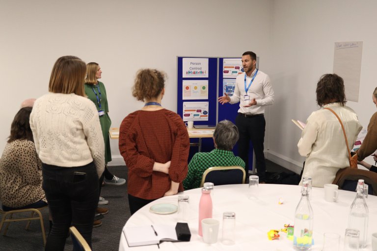 People talking at engagement event