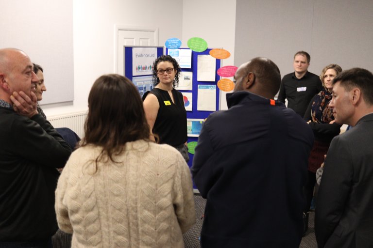 People talking at engagement event