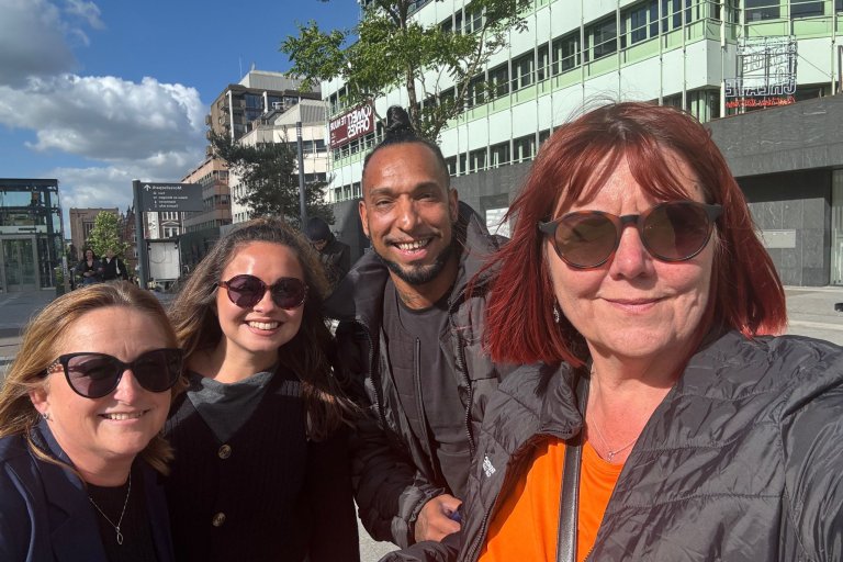 People smiling in the sun